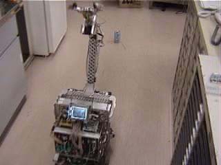 『移動系の自由度も用いて物体を操作する小型移動マニピュレータ～その3：物体把持運搬動作』をダウンロードする